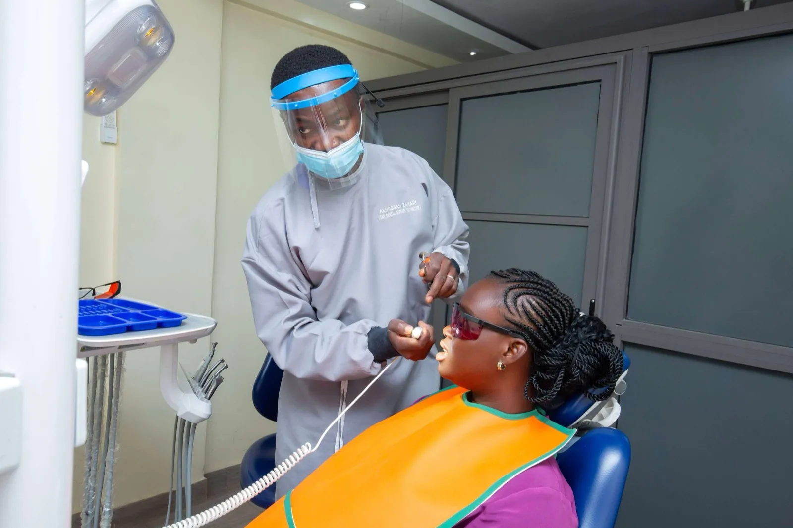 A Zenith dentist carefully treating a patient in our modern surgery